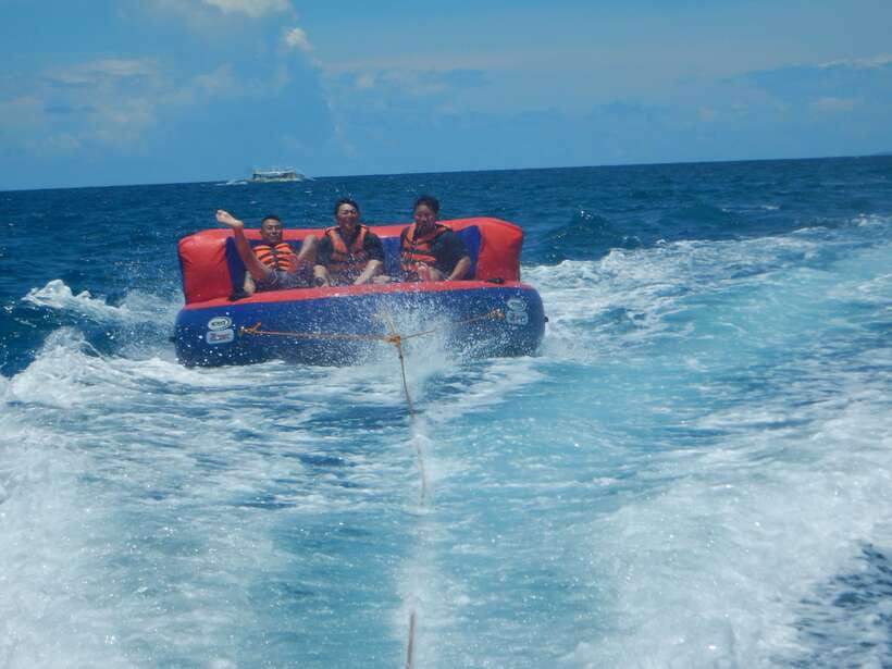 Boracay: Flying Donut Water Tubing Experience - Photos, shoreline views, and the ride back