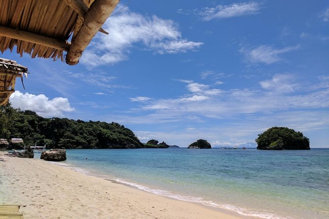 Boracay Island Hopping + Hot Kawa + Parasailing + Helmet Diving - Crocodile Island, Balinghai Beach, and Coral Garden