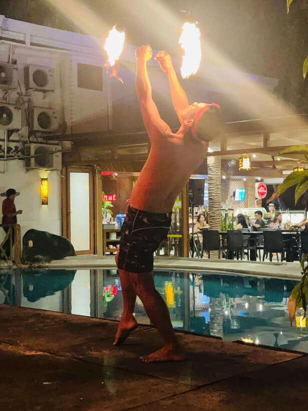 Borocay: Fire Dancing Show at Red Coconut Beach Hotel - Fire, rhythm, and a 15-minute finish