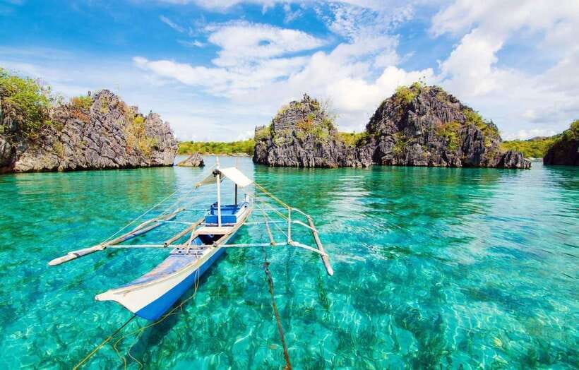 Coron: Coastal Cliffs, Beach & Malcapuya Island Hopping Tour - Starting from downtown Coron