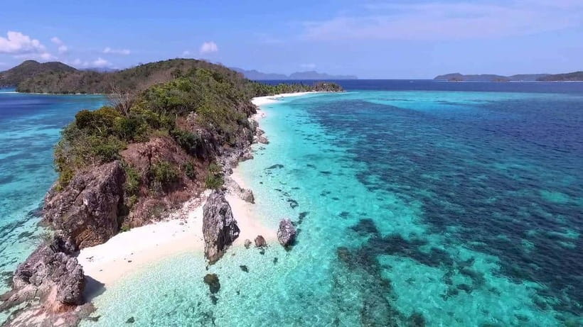 Coron: Coastal Cliffs, Beach & Malcapuya Island Hopping Tour - Malcapuya Island is the day’s main beach stop