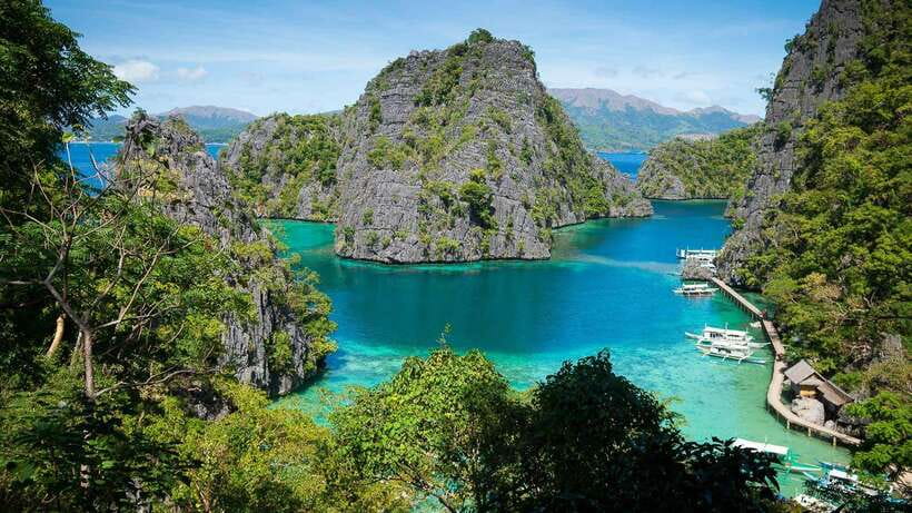 Coron: Complete Island Hopping Guided Tour with Lunch - Twin Lagoon and the changing water temperatures