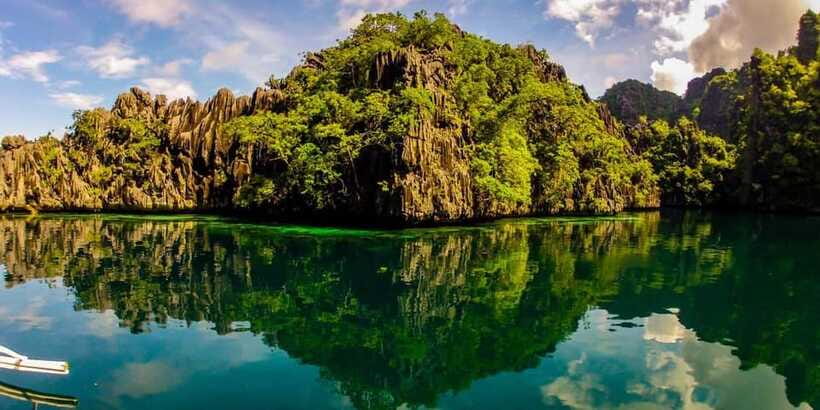 Coron: Complete Island Hopping Guided Tour with Lunch - Skeleton Wreck, a shallow site for snorkelers