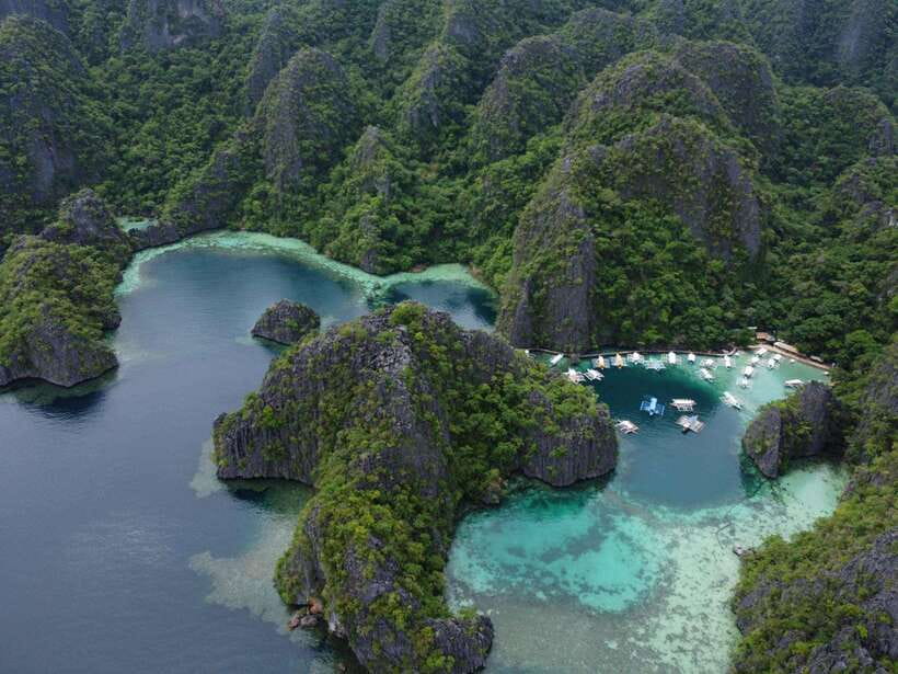 Coron: Kayangan Lake, Twin Lagoon, and Siete Pecados Tour - Twin Lagoon and the swim between two waters