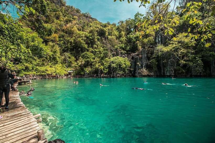 Coron: Off-Bay Islands, Lagoons and Lakes Hopping Tour - Lunch, photos, and the human side of the trip
