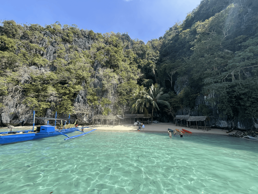 Coron: Private Boat Hire with Guided Tour and Lunch on Beach - Kayangan Lake, the postcard favorite