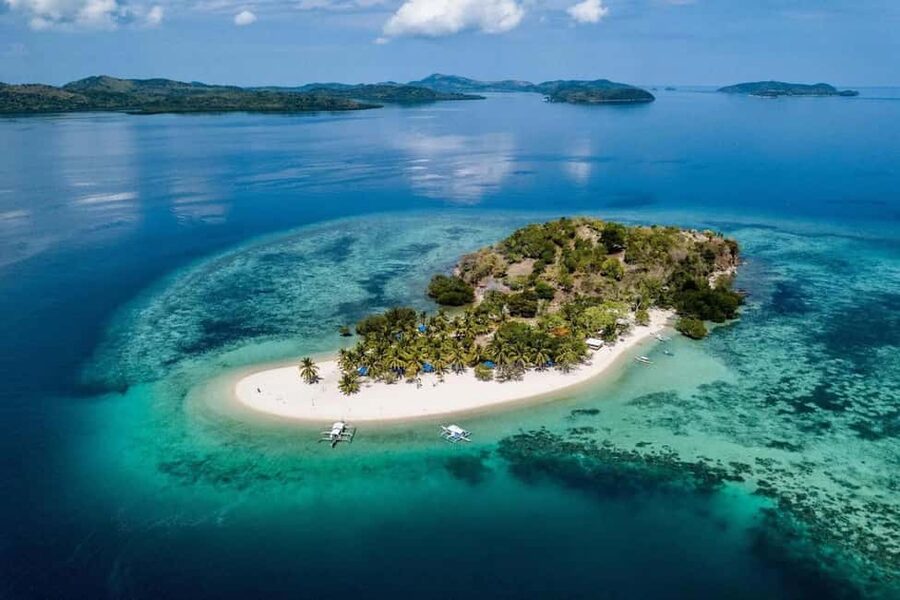 Coron: Reefs and Wrecks Tour with Snorkeling Equipment - Lusong Coral Garden and the first look below
