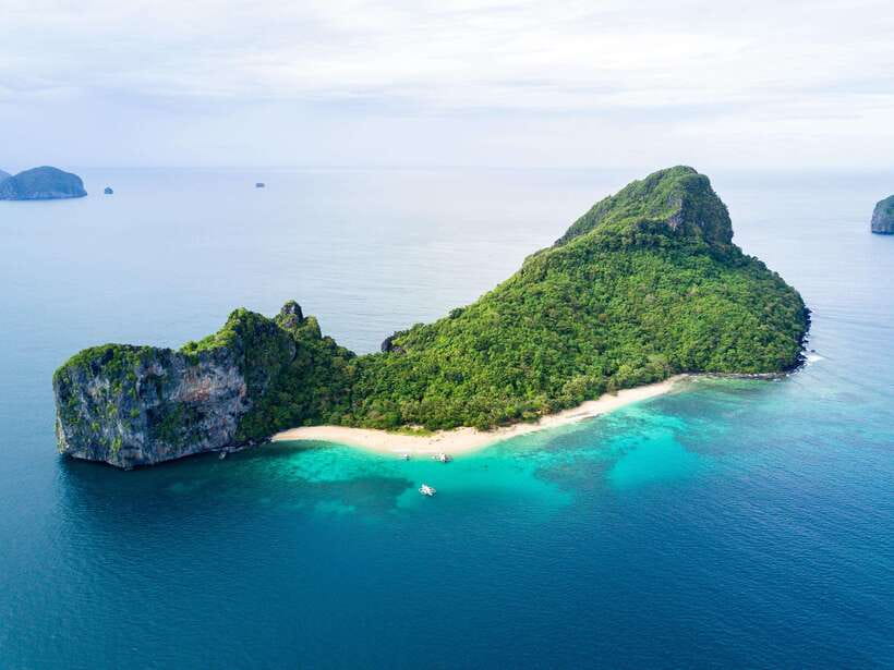 El Nido: Island Hopping and Snorkeling Private Boat Tour C - Talisay Beach for a quieter swim and photo stop