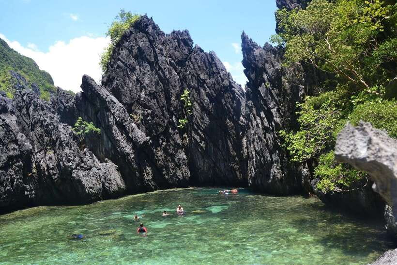 El Nido Island Hopping Tour C: Hidden Beaches & Shrine - The crew, boat, and group experience