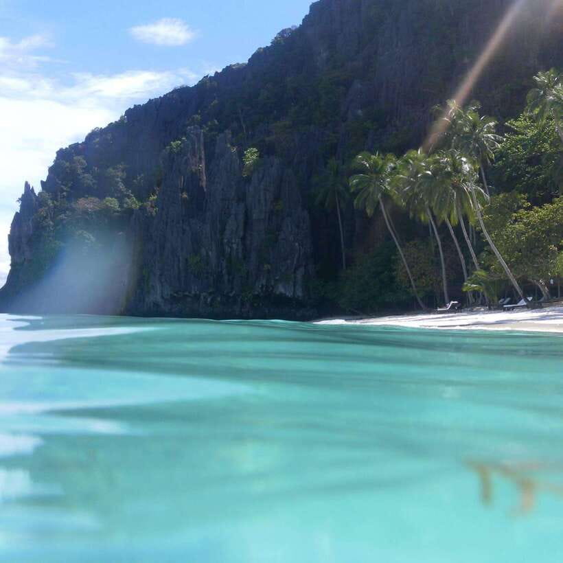 El Nido: Snake Island and Cave Tour with Island Lunch - What to pack for wet boat transfers