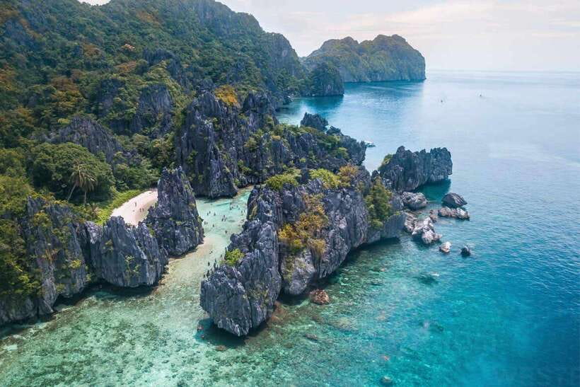 El Nido: Tour C to Hidden Beach, Helicopter Island & More - Helicopter Island and the first cliff views