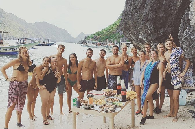 El Nido Tour D Full Day w/ Beach Lunch - Cadlao Lagoon beneath tall limestone walls