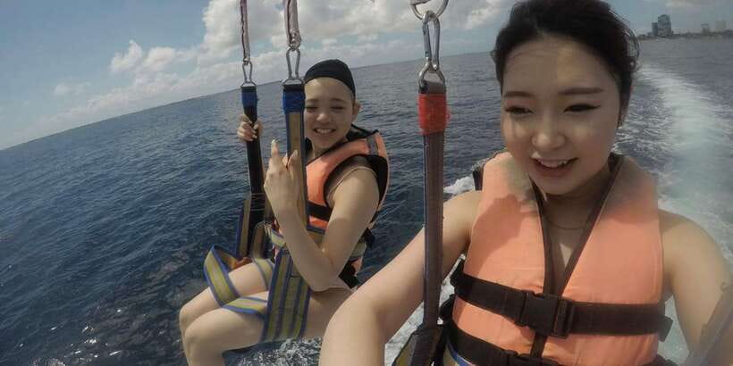 From Cebu: Mactan Island 3 Watersport Activities Tour - Banana boat fun for up to eight people