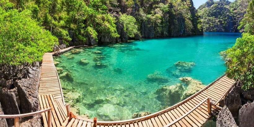 From Coron: Island Hopping Boat Day Trip with Buffet Lunch - Twin Lagoon brings another memorable swim