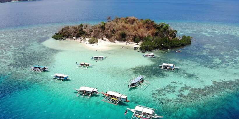 From Coron: Island Hopping Boat Day Trip with Buffet Lunch - Beach time at CYC, Sunset, or Atwayan