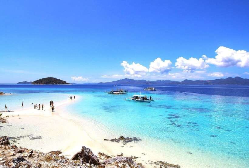 From Coron: Private Island-Hopping Cruise with Lunch - Bulog Dos offers the day’s most unusual view