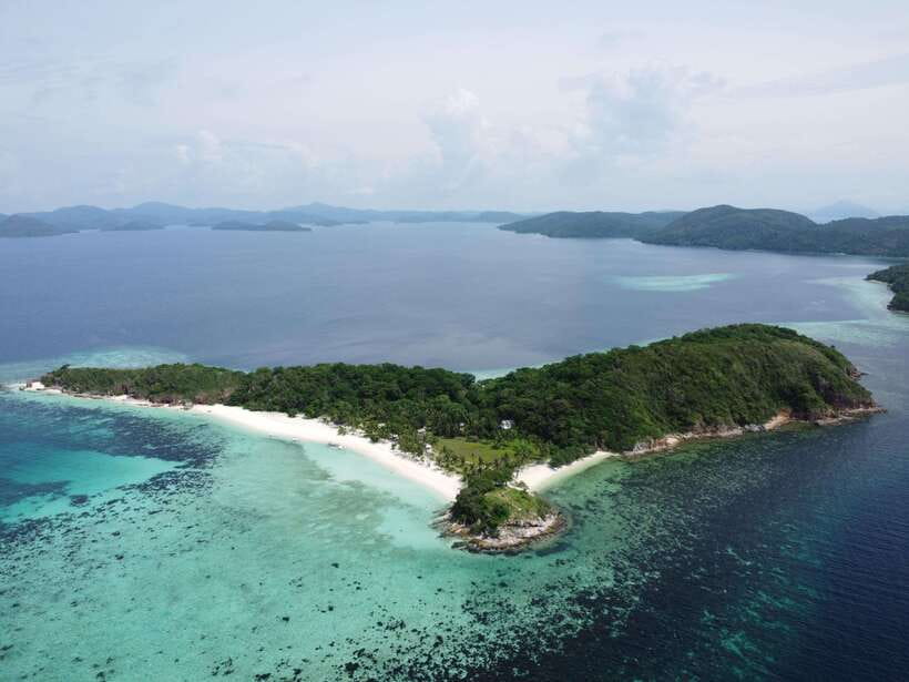 From Coron Town: Beaches and Islands Boat Tour with Lunch - The boat, the crew, and the pickup plan