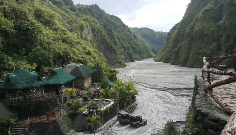 From Manila: Puning Hot Spring Day Trip - Crossing the lahar channels by 4x4