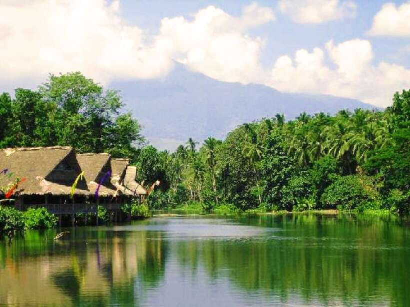 Full Day Tour Villa Escudero Plantation - Riding through a working coconut plantation