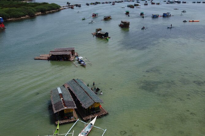 Island Hopping Experience: Snorkeling & Bamboo Cottages! - Riding a floating bamboo cottage