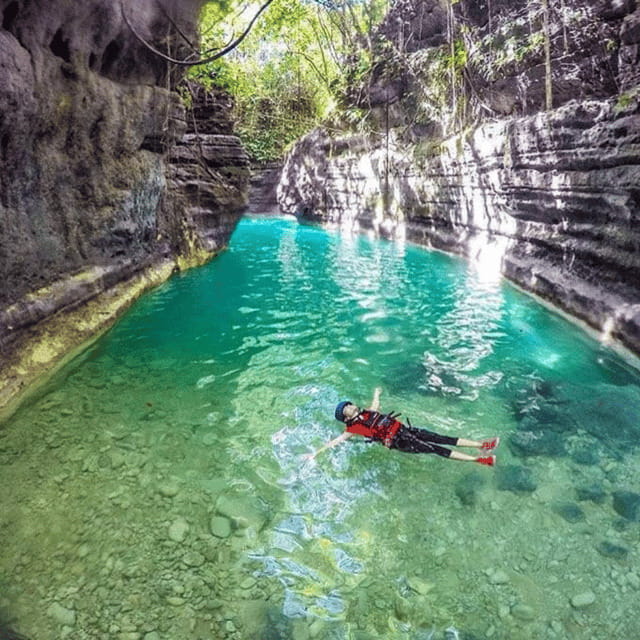 Kawasan Falls Canyoneering Transfers from Cebu with Lunch - Scrambling, swimming, and choosing your jumps