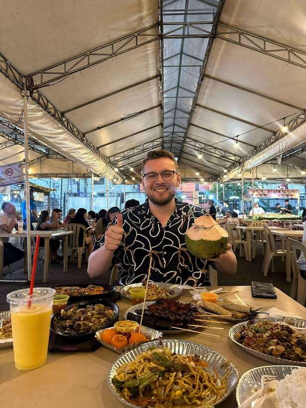 Makati Street food Tour, End with a Rooftop City View - Filipino street food with a local guide