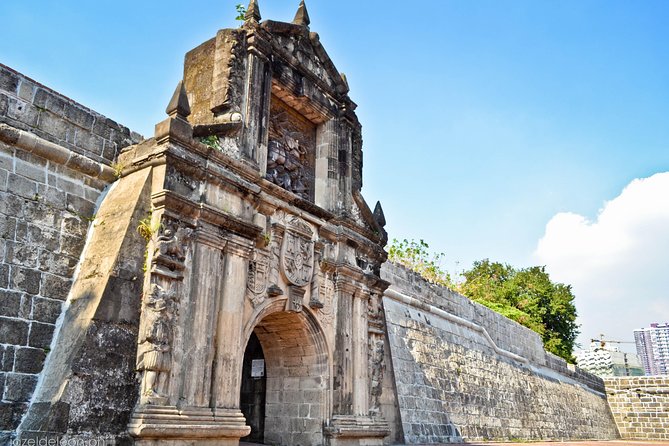 Manila Old and New: Sightseeing Tour Including Intramuros and Fort Santiago - Entering Intramuros through its Spanish-era streets