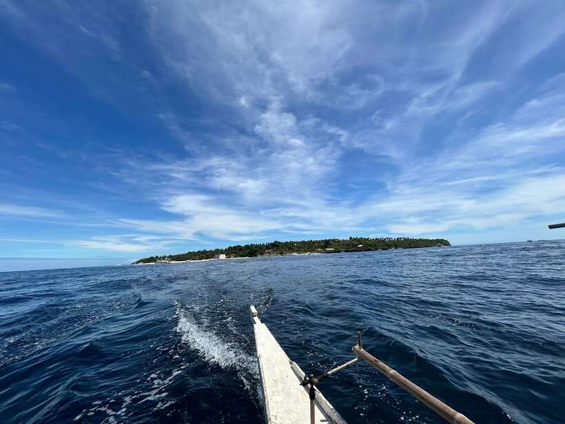 Pamilacan island: Dolphins, snorkel, lunch and walking tour - Leaving Panglao before the heat