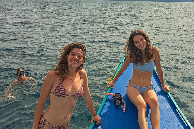 Port Barton Full Day Island Hopping with Buffet Lunch - Maxima Island and its white sand