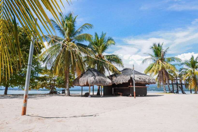 Puerto Princesa: Cowrie Island Guided Day Tour with Meal - Massage time by the water