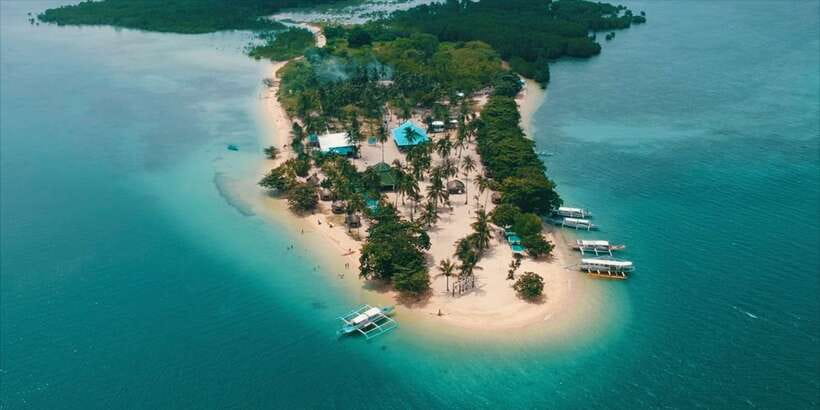 Puerto Princesa: Cowrie Island Guided Day Tour with Meal - Who should book this Cowrie Island trip?