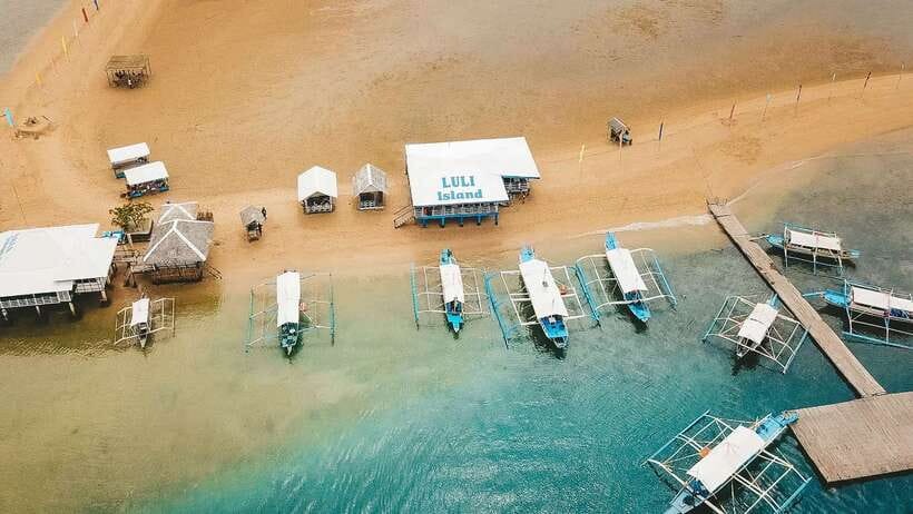 Puerto Princesa: Private Honda Bay Island Hopping Tour - Honda Bay compared with El Nido