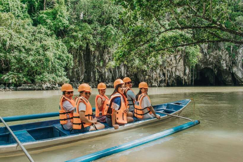 Puerto Princesa: Underground River, Zipline, Paddleboat Tour - Sabang Beach and the wharf