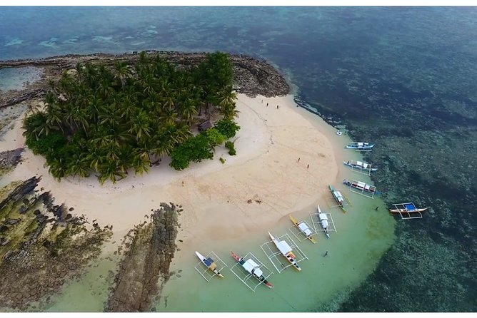 Siargao Island Hopping & land Tour - Daku Island: white sand with a local community