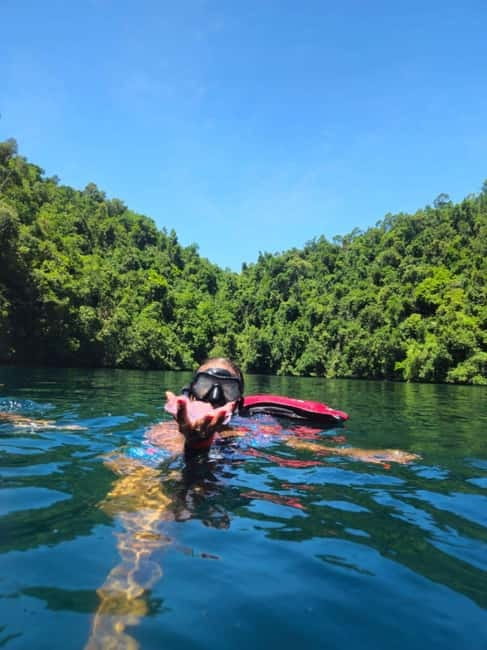 Siargao: Jellyfish Sohoton Cove Tour with Lunch and Pickup - Leaving Siargao by outrigger boat