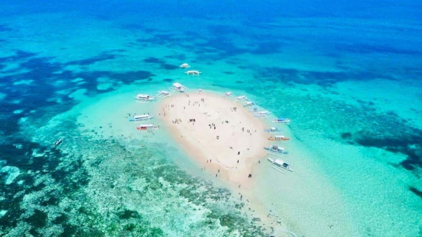 Tri island tour: Naked Island, Daku Island and Guyman Island - Coral Garden and Secret Island depend on the current